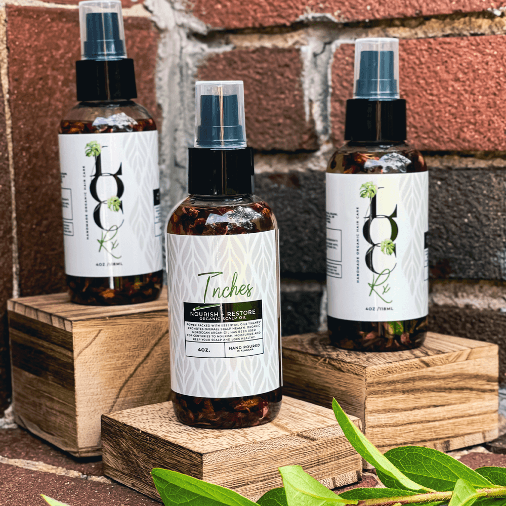 Inches - Nourishing Loc Oil - LocRx Alt text: Inches Nourishing Loc Oil - promotes healthy hair growth and protects locs with natural antioxidants and essential oils. Perfect for all hair types and textures. Say goodbye to dry, brittle locs and hello to healthy, vibrant locks!