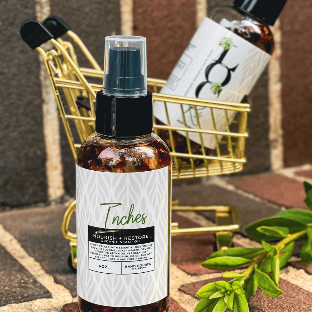 Inches - Nourishing Loc Oil - LocRx Alt text: Inches Nourishing Loc Oil - promotes healthy hair growth and protects locs with natural antioxidants and essential oils. Perfect for all hair types and textures. Say goodbye to dry, brittle locs and hello to healthy, vibrant locks!